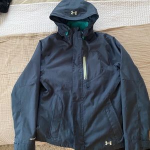 snowboarding jacket with removable fleece jacket and waterproof shell with hood.